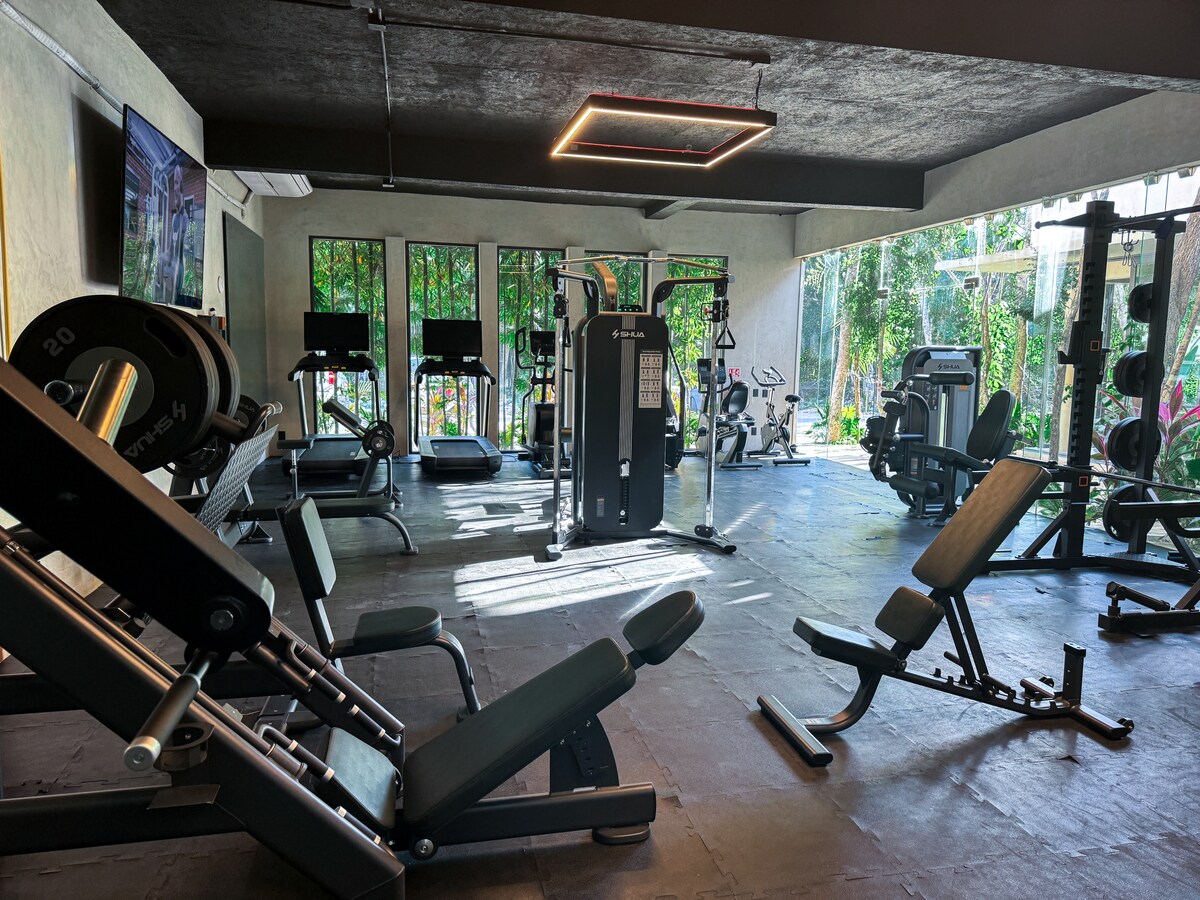 Rooftop terrace with jungle canopy views at Luxury Jungle VIBE in Tulum Mexico